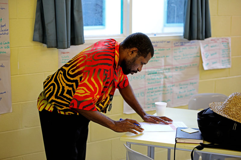 Jeffery Robby of Weightlifting Federation taking notes at MiSO training. - A. Molen.